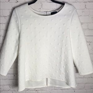 White Anthropologie textured polka dot top